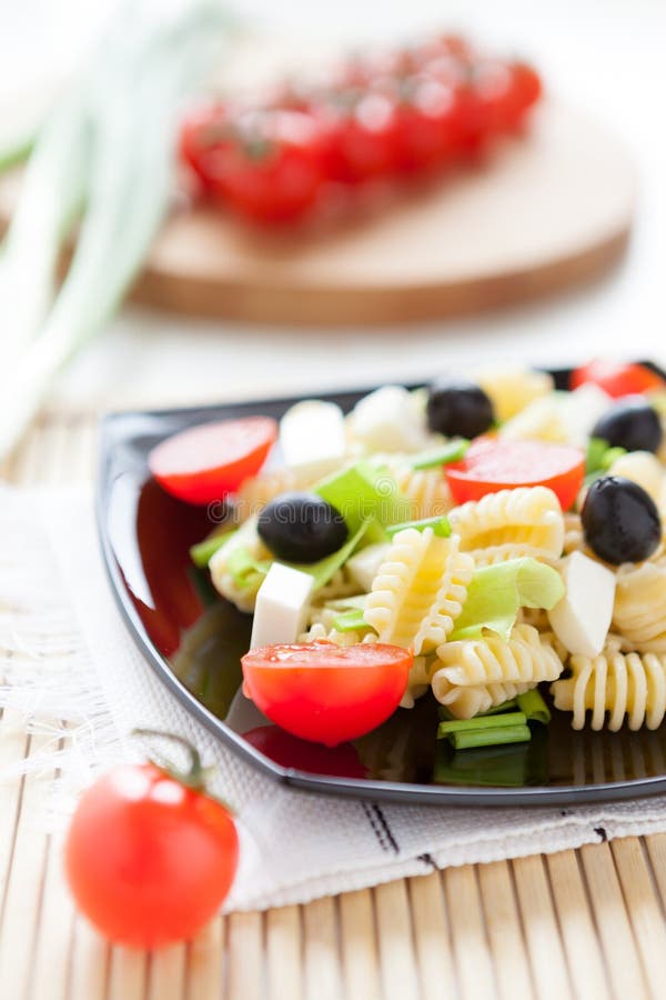 Pasta with cheese and cherry tomatoes