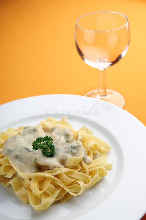 Pasta with cheese sauce stock image. Image of parsley - 10232079