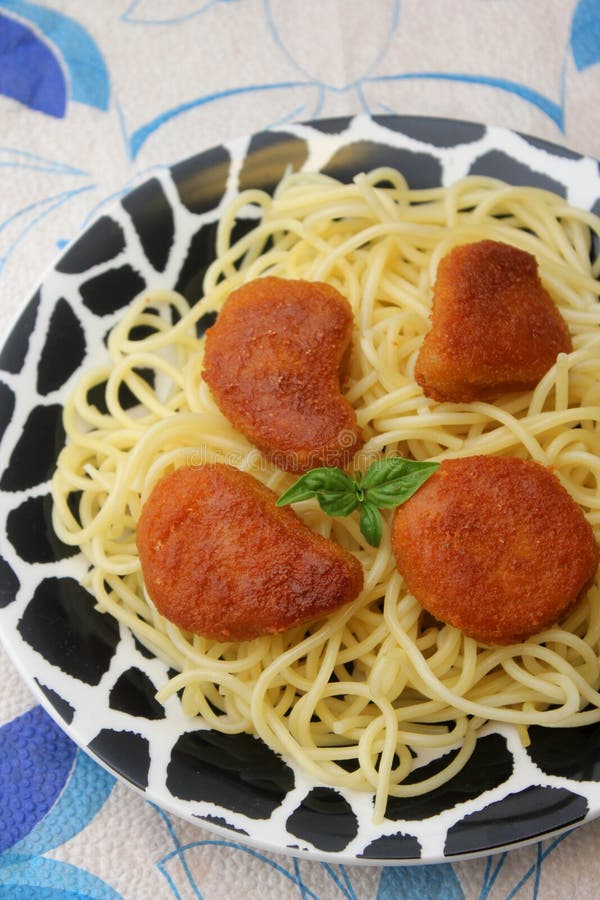 Pasta with chicken nuggets stock image. Image of noodles - 111975571