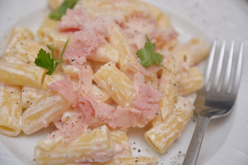 Pasta with cream and ham pasta prosciutto e panna italian dish stock images Pasta with cream and ham pasta prosciutto e panna italian dish stock images