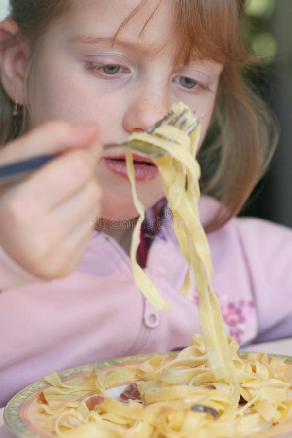 Pasta eating stock photo. Image of child, lasagne, dining 2111104