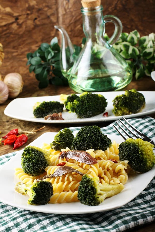 Pasta with fresh broccoli and anchovies royalty free stock photos