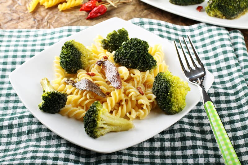 Pasta with fresh broccoli and anchovies royalty free stock photo