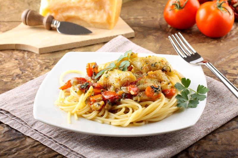 Pasta with fresh grouper fillet royalty free stock photos