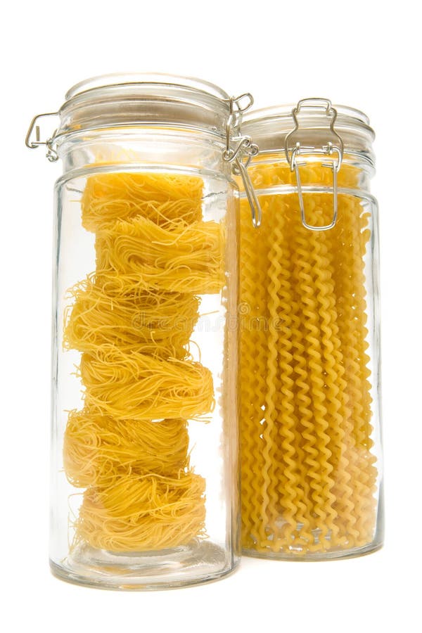 Pasta in glass can stock photo. Image of container, shapes 6031428