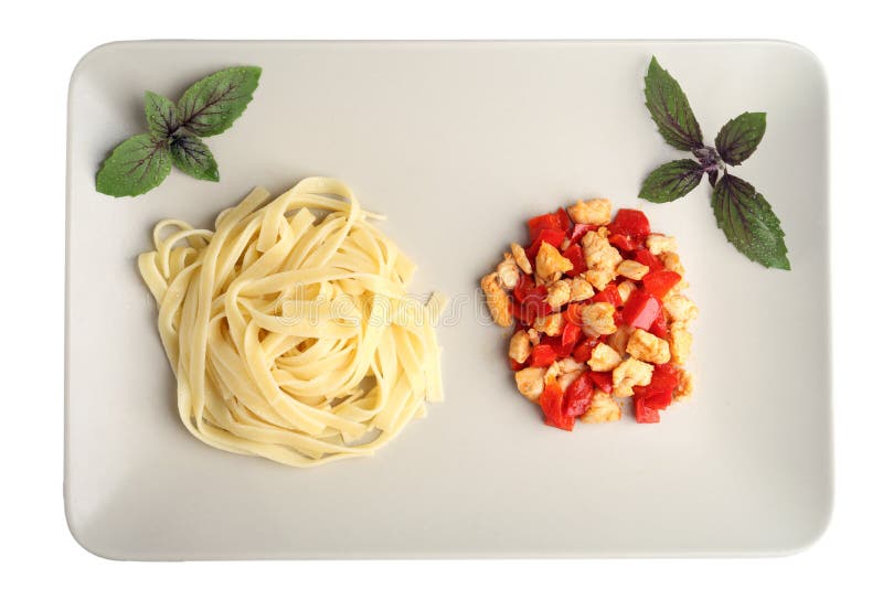 Pasta with grilled chicken and peppers. Pasta on a white backgrou royalty free stock image Pasta with grilled chicken and peppers. Pasta on a white backgrou royalty free stock image