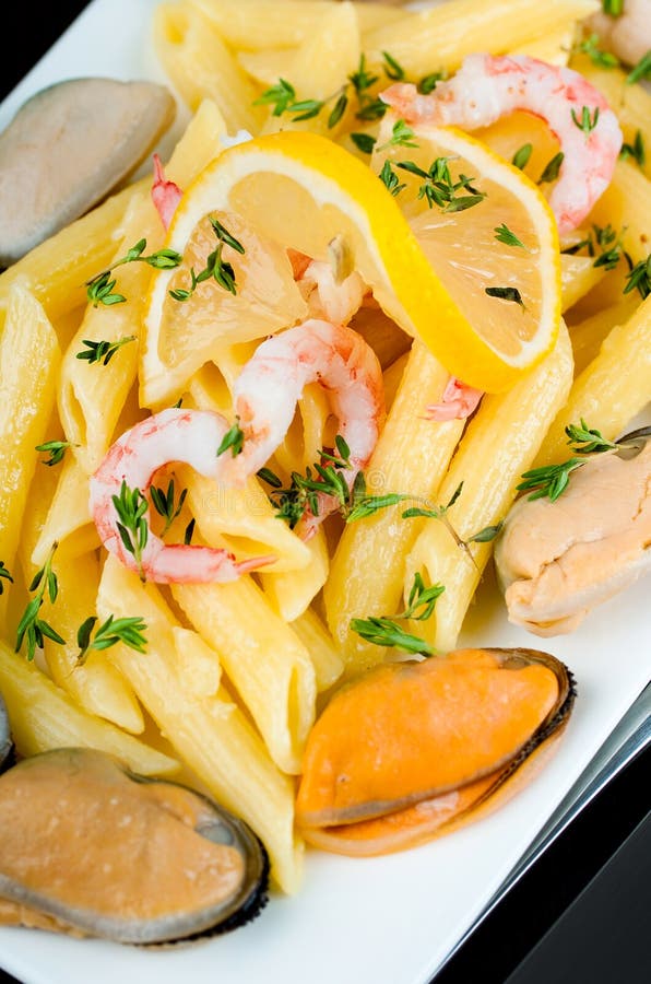 Pasta with Mussels, Shrimp and Lemon Stock Photo Image of dinner