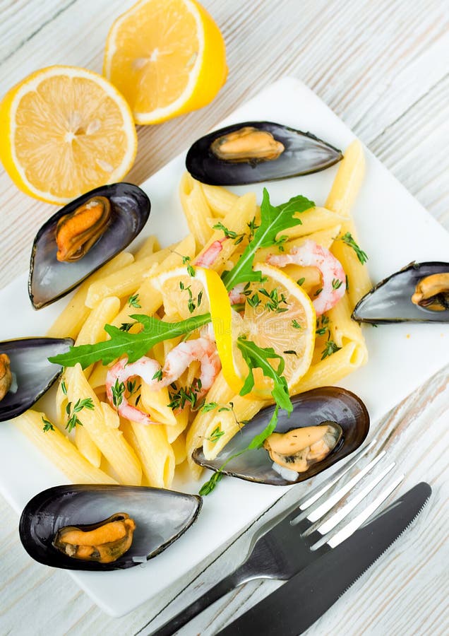 Pasta with Mussels, Shrimp and Lemon, Mediterranean Stock Photo Image