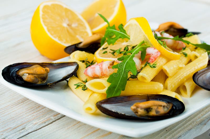 Pasta with Mussels, Shrimp and Lemon Stock Photo Image of meal