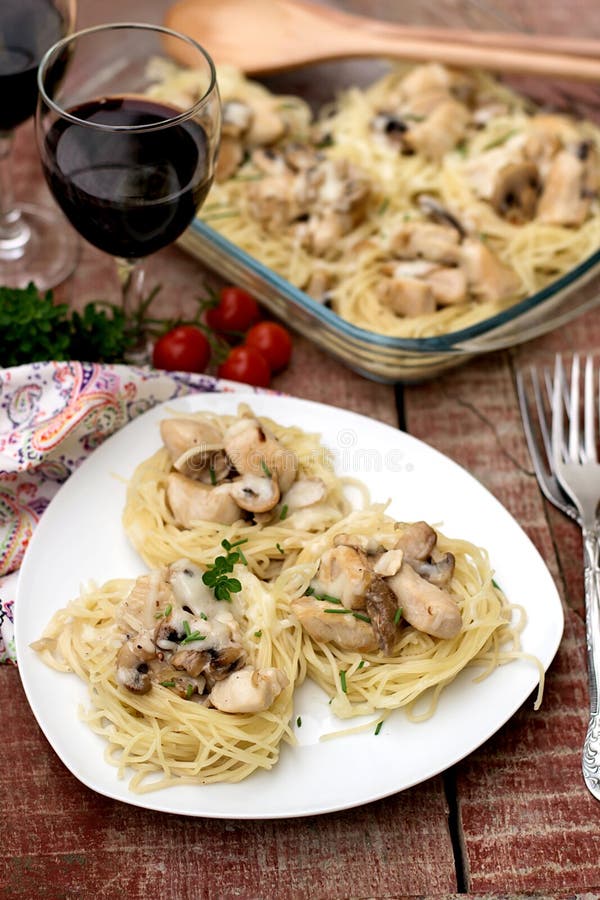 Pasta Nests with Chicken and Mushrooms with Creamy Sauce Stock Image