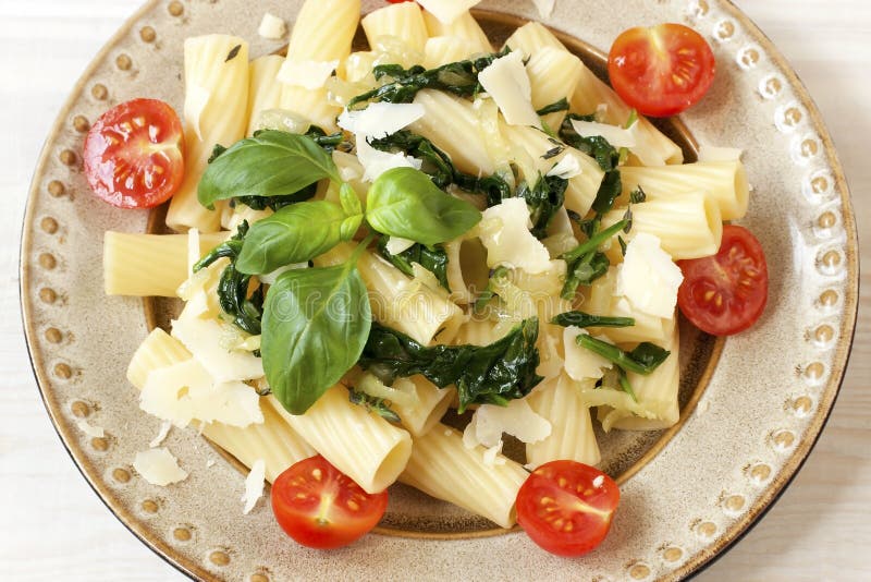 Pasta on Plate with Fresh Basil Leaves Stock Photo Image of gourmet