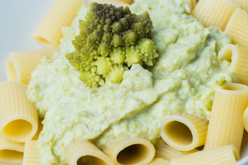 Pasta with Romanesco Broccoli Cabbage and Mozzarella Stock Photo