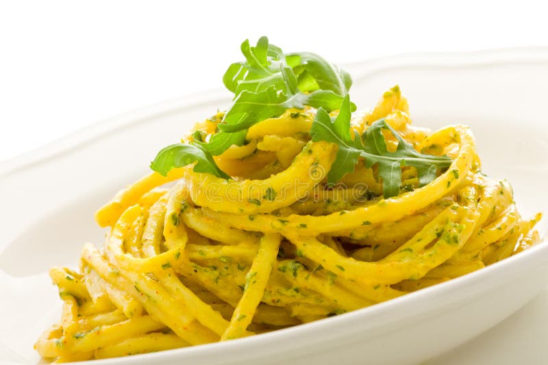 Pasta with Saffron and arugula pesto Isolated