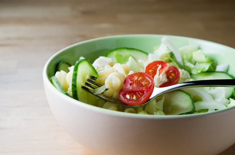 Pasta Salad in Bowl stock image. Image of onion, vegetarian 20929989