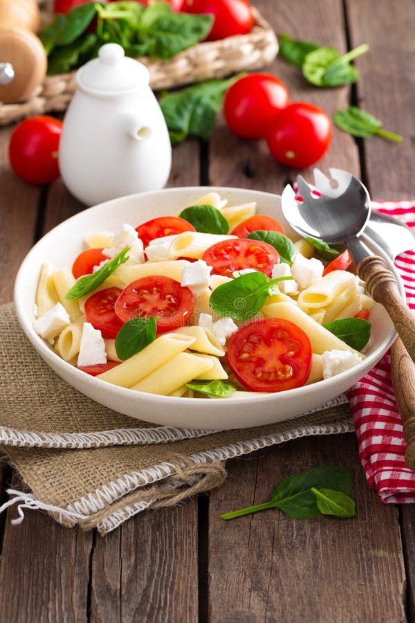 Pasta Salad with Fresh Red Cherry Tomato and Feta Cheese. Italian