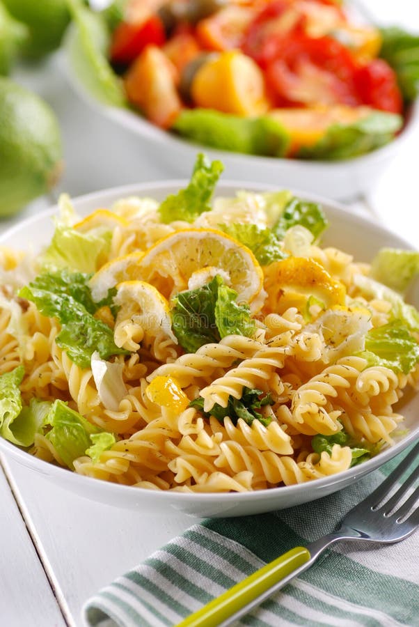 Pasta salad with lettuce stock image. Image of fork, background - 33065321