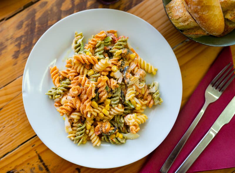 Pasta and seafood salad on plate royalty free stock photo