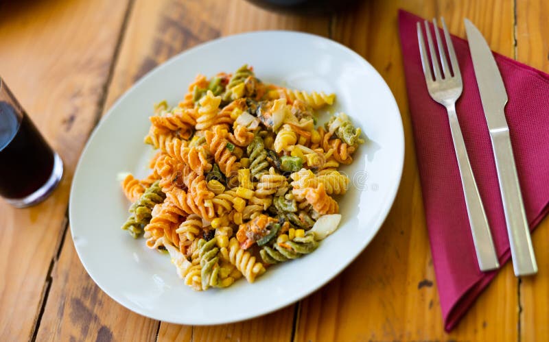 Pasta and seafood salad on plate royalty free stock images
