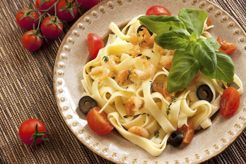 Pasta with shrimps stock image