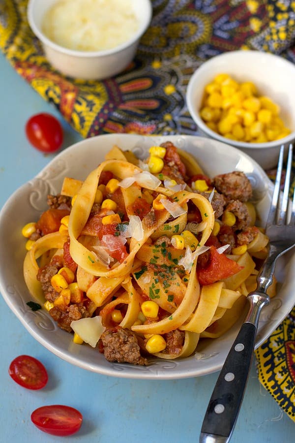Pasta Tagliatelle with Ground Beef, Tomato and Sweetcorn Stock Photo