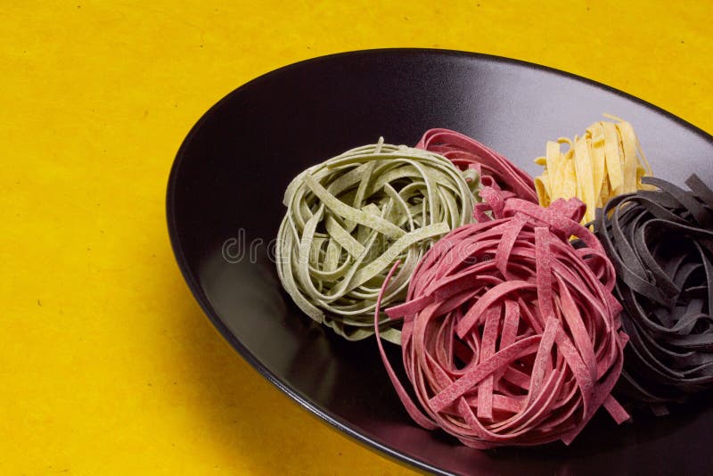 Pasta Tagliatelle Nest of Colorful Stock Image - Image of dinner, dyed ...