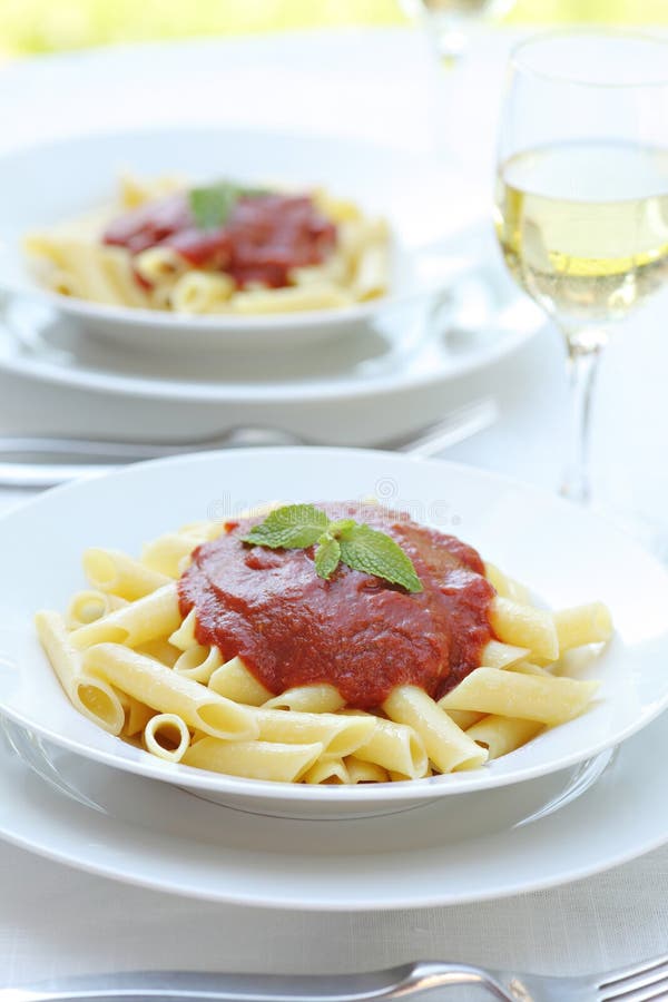 Pasta with Tomato Sauce and Grated Cheese Stock Photo Image of tilted