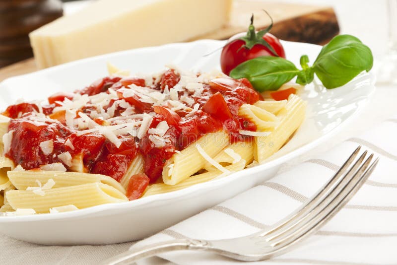 Pasta with Tomato Sauce and Grated Cheese Stock Photo Image of tilted