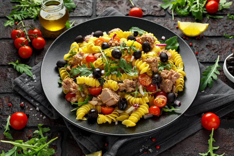 Pasta Tuna Salad with Tomatoes, Wild Rocket, Black Olives and Red Onion ...