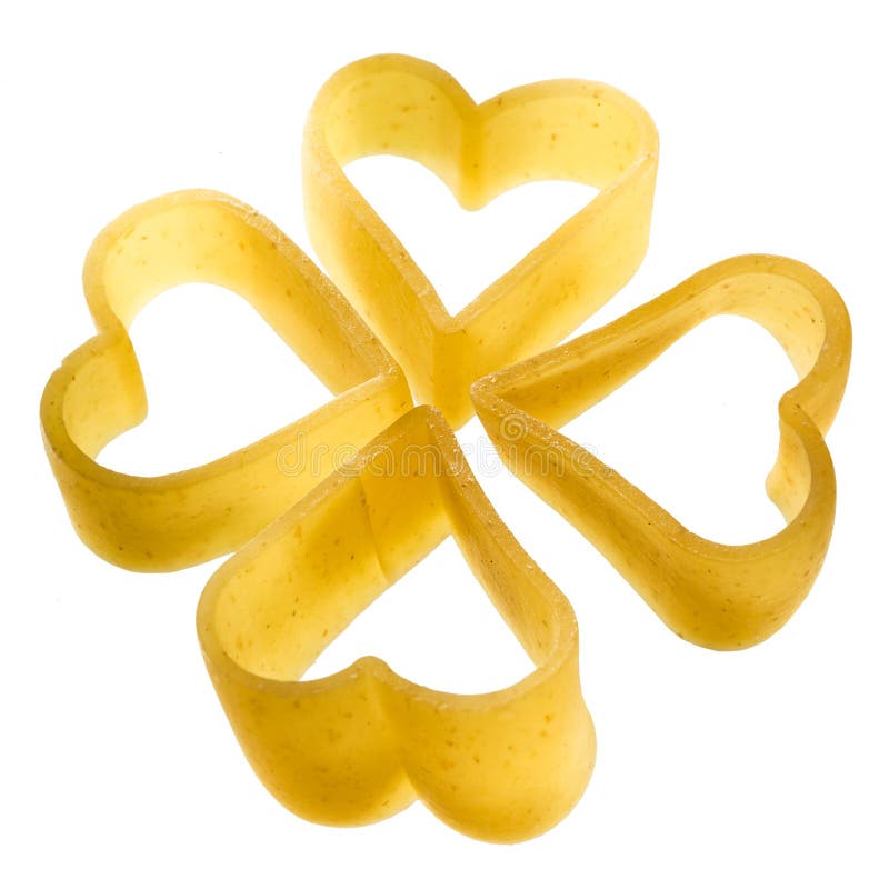 Pasta. Uncooked heart isolated on white stock photo