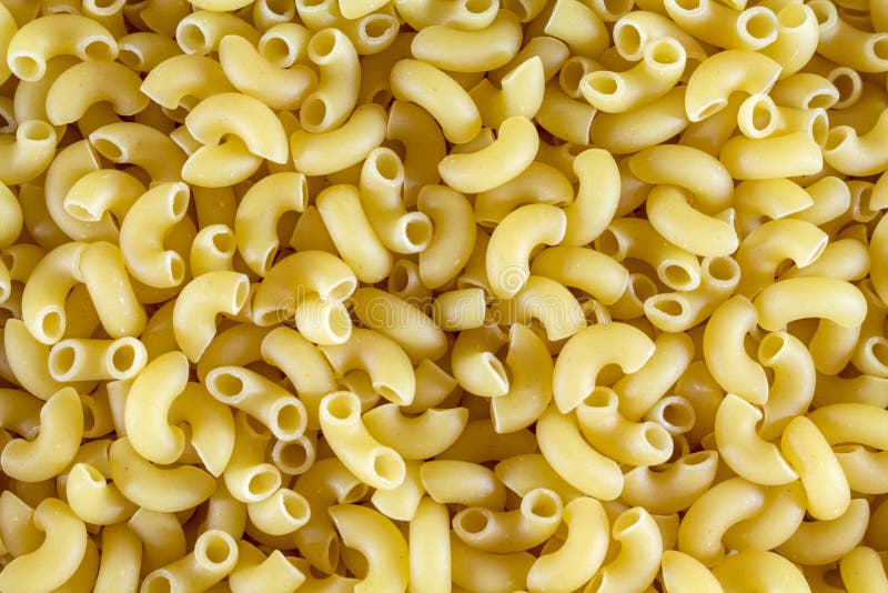 Pasta unprepared horns for all photos. Close-up. Pasta unprepared horns for all photos royalty free stock photography Pasta unprepared horns for all photos. Close-up. Pasta unprepared horns for all photos royalty free stock photography