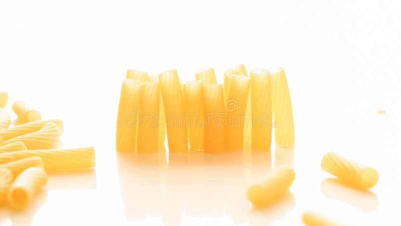 Pasta on a white background top view stock photos