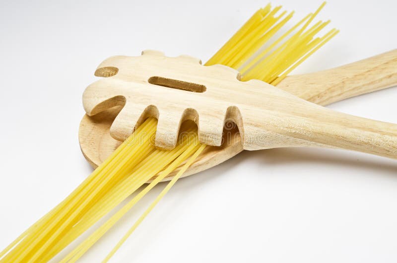 Pasta and wooden spoon stock photo. Image of italia, spaghetti 20713674