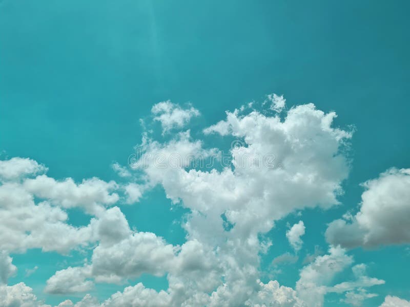 Pastel Blue Sky and Clouds. Bright Sweet Sky Concept Stock Photo