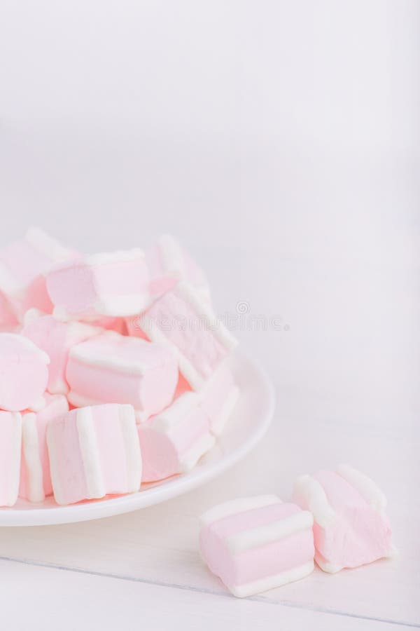 Pastel Closeup Sweets. Pink and White Soft Marshmallow on Plate Stock