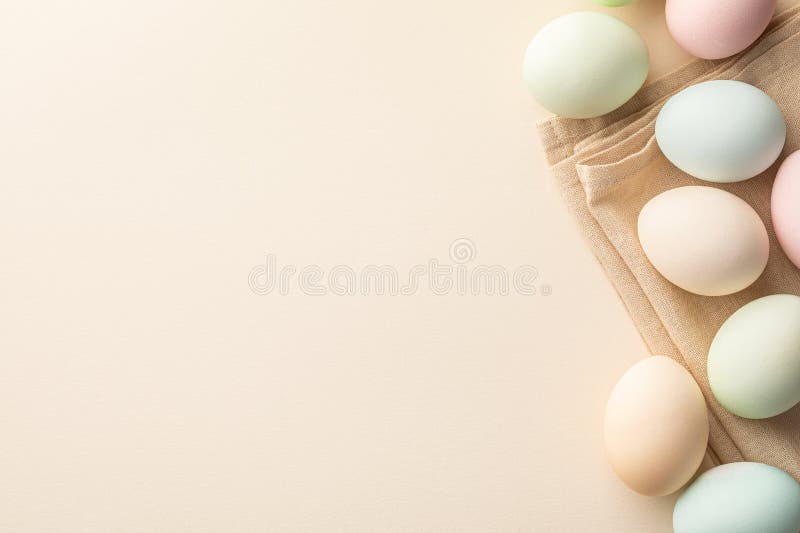A Pastel Colored Easter Eggs Background in Light Tones Stock Photo