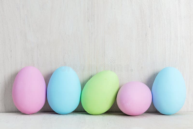 Pastel Easter Eggs on Wooden Table. Stock Photo Image of eggs, april
