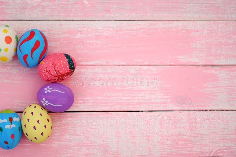 Pastel Hand painted Easter Eggs with pink background stock images Pastel Hand painted Easter Eggs with pink background stock images