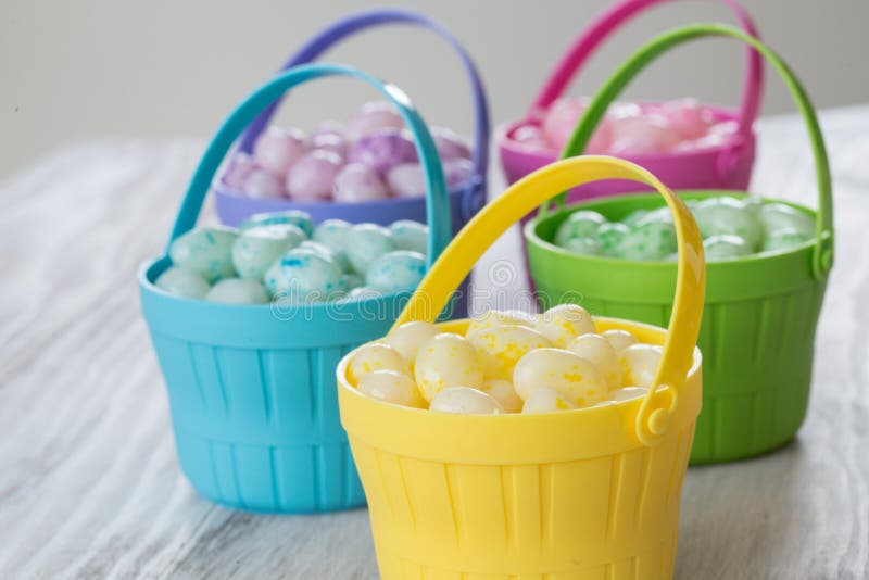 Pastel Jelly Beans in Colored Baskets for Easter Stock Image Image of