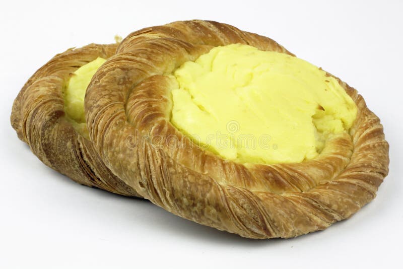 Bolos de pastelaria com creme imagem de stock