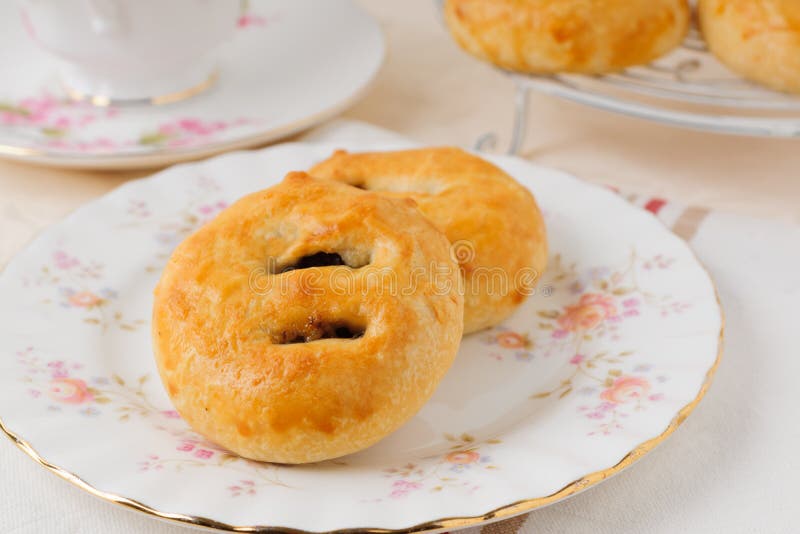 Eccles cakes a small round pastry filled with currants or raisins originating from the town of Eccles in Lancashire England. Eccles cakes a small round pastry filled with currants or raisins originating from the town of Eccles in Lancashire England