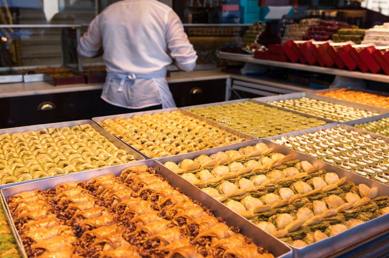 Various Turkish Baklava pastry dessert for sale at a confectionery on a street of Istanbul, Turkey. Baclava was one of the most popular sweet pastries of Ottoman cuisine. Various Turkish Baklava pastry dessert for sale at a confectionery on a street of Istanbul, Turkey. Baclava was one of the most popular sweet pastries of Ottoman cuisine