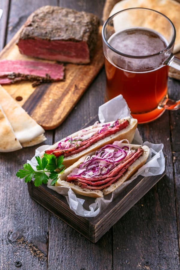 Pastrami with Cabbage in Pita Bread with Beer, Rustic. Stock Image