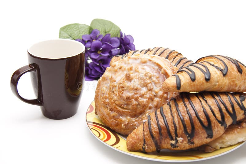 Pastry with coffee cup