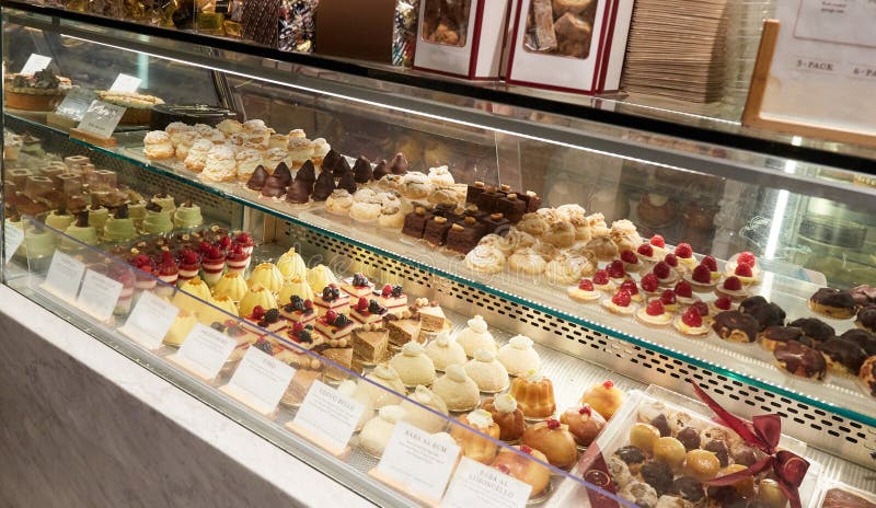 Pastry display with assorted cakes royalty free stock image