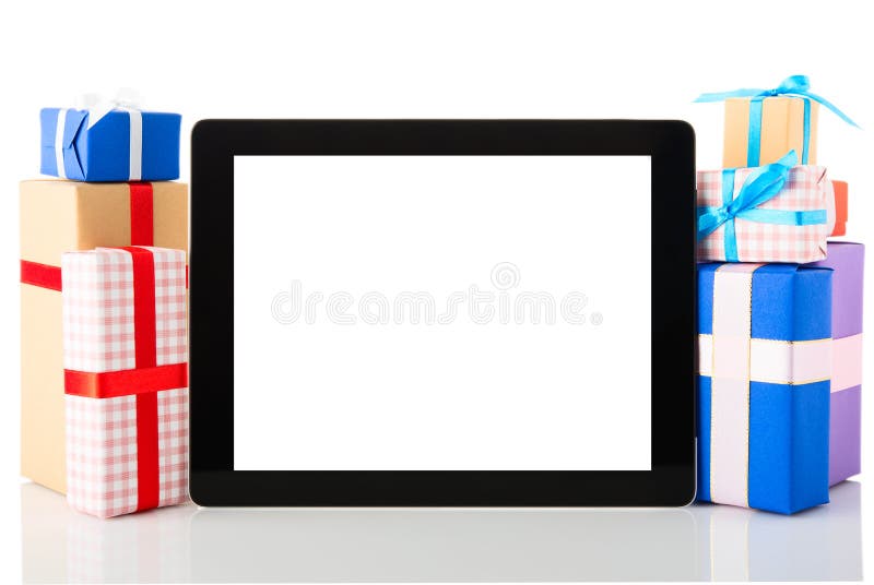 Tablet pc with gift boxes on white background. Tablet pc with gift boxes on white background