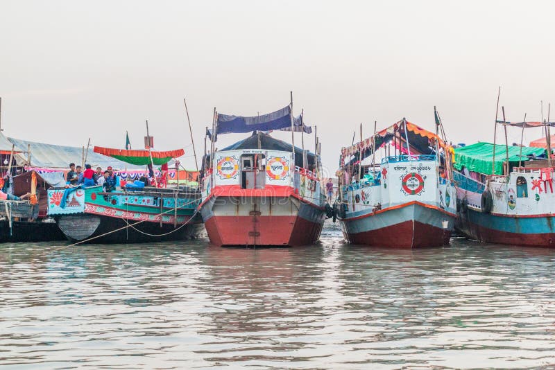 PASUR, BANGLADESH - NOVEMBER 13, 2016: Boats at the beach at Dublar Char Dubla island from Pasur river, Bangladesh. They brought