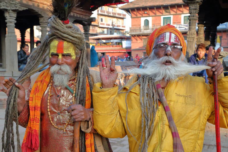 PATAN, NEPAL - DECEMBER 21, 2014: Portrait of two Sadhus Holy men at Durbar Square royalty free stock images PATAN, NEPAL - DECEMBER 21, 2014: Portrait of two Sadhus Holy men at Durbar Square royalty free stock images