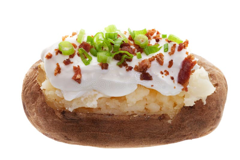 A baked potato with sour cream, bacon bits, and Green onions. A baked potato with sour cream, bacon bits, and Green onions