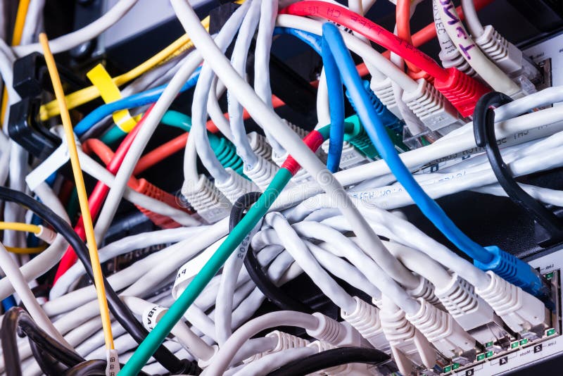 Patch cables connected to data router royalty free stock photos