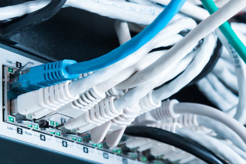Patch cables connected to data router royalty free stock image